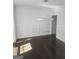 Dining room with wainscotting and modern chandelier at 718 Avalon Way, Peachtree City, GA 30269