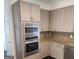 Beautiful kitchen featuring stainless steel appliances, light wood cabinets, and granite countertops at 718 Avalon Way, Peachtree City, GA 30269