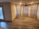 Spacious living room featuring hardwood floors and large windows for plenty of natural light at 718 Avalon Way, Peachtree City, GA 30269
