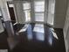 Bright, light-filled living room features large windows at 718 Avalon Way, Peachtree City, GA 30269