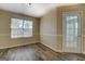 Well-lit bonus room with wood flooring, neutral paint and private entrance at 4650 Atlanta Hwy, Rutledge, GA 30663