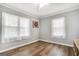 Comfortable bedroom with hardwood floors, lots of natural light, and neutral walls at 1083 Hampton Rd, Hampton, GA 30228