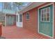 Wood deck featuring views of the backyard and side door at 81 Bowers Rd, Moreland, GA 30259