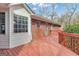 Wood deck featuring views of the backyard and windows at 81 Bowers Rd, Moreland, GA 30259