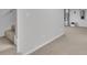 Finished basement with carpeted stairs and flooring at 81 Bowers Rd, Moreland, GA 30259