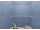A blue walk-in closet with installed wire shelving at 81 Bowers Rd, Moreland, GA 30259