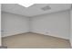 Neutral room with drop ceiling and tan carpeting at 81 Bowers Rd, Moreland, GA 30259