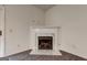 Close up of modern fireplace featuring marble tile and classic white mantle at 3802 Austin Park Ln, Decatur, GA 30032