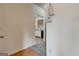 Hallway with carpet and tile flooring leads to kitchen and other rooms at 3802 Austin Park Ln, Decatur, GA 30032