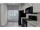 Bright kitchen featuring stainless steel appliances, granite countertops, and ample cabinet space at 3802 Austin Park Ln, Decatur, GA 30032