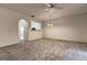 Open living room featuring plush carpeting, a fireplace, and an open-concept design at 3802 Austin Park Ln, Decatur, GA 30032