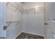 Spacious walk-in closet featuring white walls, wire shelving, and carpeted floor at 3802 Austin Park Ln, Decatur, GA 30032