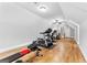 Home gym with exercise equipment and vaulted ceilings at 203 Shelby Ln, Fayetteville, GA 30215