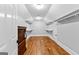 Spacious walk-in closet with hardwood floors and custom shelving at 203 Shelby Ln, Fayetteville, GA 30215