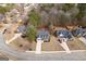 Desirable neighborhood with well-manicured lawns, mature trees, and convenient street parking at 306 Interlake Pass, Mcdonough, GA 30252