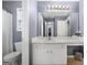 Bathroom featuring a white vanity with a makeup area and neutral paint at 306 Interlake Pass, Mcdonough, GA 30252