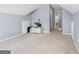 Spacious bonus room featuring sloped ceilings and neutral carpeting at 306 Interlake Pass, Mcdonough, GA 30252
