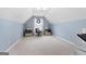 Bonus room featuring neutral paint, carpet, and sloped ceilings at 306 Interlake Pass, Mcdonough, GA 30252