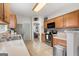 Kitchen with stainless steel appliances, ample counter space and a pantry at 306 Interlake Pass, Mcdonough, GA 30252