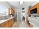 Spacious kitchen featuring stainless appliances, and a well lit pantry at 306 Interlake Pass, Mcdonough, GA 30252