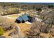 A stunning aerial view of this property's location, highlighting it's landscaping at 111 Dixson Rd, Bowdon, GA 30108