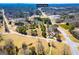 Aerial view of 111 Dixson Rd showcasing the lot, trees, and proximity to Downtown Bowdon at 111 Dixson Rd, Bowdon, GA 30108