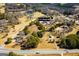 An aerial view of 111 Dixson Rd showcasing the expansive lot, mature trees, and proximity to neighborhood homes at 111 Dixson Rd, Bowdon, GA 30108