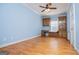 Comfortable bedroom features hardwood floors, a ceiling fan and custom built-ins at 111 Dixson Rd, Bowdon, GA 30108