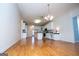 Bright kitchen featuring white cabinetry, island, and great lighting at 111 Dixson Rd, Bowdon, GA 30108