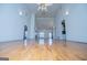 Spacious living room featuring gleaming hardwood floors and cathedral ceilings at 111 Dixson Rd, Bowdon, GA 30108