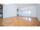 Expansive living room with hardwood floors, vaulted ceilings and seamless transitions at 111 Dixson Rd, Bowdon, GA 30108