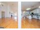 Open layout showcasing the living room and kitchen with an island at 111 Dixson Rd, Bowdon, GA 30108