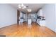 Open living space with hardwood floors leading to the bright kitchen at 111 Dixson Rd, Bowdon, GA 30108