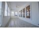 Spacious sunroom with tile floor and ample windows at 111 Dixson Rd, Bowdon, GA 30108