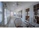 Inviting sunroom with tile flooring, ceiling fans, and natural light at 111 Dixson Rd, Bowdon, GA 30108