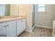 Bathroom featuring double sink, walk-in shower and granite counters at 12 Paces Lakes Overlook, Dallas, GA 30157