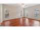 Bright bedroom with wood floors and generous windows with outside views at 12 Paces Lakes Overlook, Dallas, GA 30157