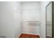Large closet features wooden floors, wire shelves and storage at 12 Paces Lakes Overlook, Dallas, GA 30157