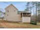 Back of home with screened porch at 12 Paces Lakes Overlook, Dallas, GA 30157