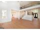 Large living room features soaring ceilings, wood floors, and natural light at 4604 Mossey Dr, Stonecrest, GA 30038