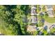 An aerial view highlighting property lines within a verdant residential area at 4770 Shiloh Springs Rd, Cumming, GA 30040