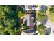 An aerial view showcases a neatly arranged neighborhood with well-maintained lawns at 4770 Shiloh Springs Rd, Cumming, GA 30040