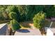 Aerial view of a backyard featuring lush greenery and a charming gazebo at 4770 Shiloh Springs Rd, Cumming, GA 30040