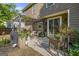Backyard featuring a covered patio, outdoor furniture, and a grill at 4770 Shiloh Springs Rd, Cumming, GA 30040