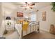 Bedroom with soft lighting, a ceiling fan, and ornamental decor at 4770 Shiloh Springs Rd, Cumming, GA 30040