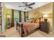 Bedroom with two-toned walls, a ceiling fan, and two windows at 4770 Shiloh Springs Rd, Cumming, GA 30040