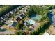 Overhead view of community amenities includes a sparkling pool and tennis courts at 4770 Shiloh Springs Rd, Cumming, GA 30040