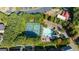 Overhead shot displays community amenities with tennis courts, pool, and clubhouse at 4770 Shiloh Springs Rd, Cumming, GA 30040