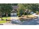 Stunning aerial view of a two-story home showcasing its curb appeal and surrounding neighborhood at 4770 Shiloh Springs Rd, Cumming, GA 30040