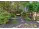 Charming garden with bench and lush greenery at 4770 Shiloh Springs Rd, Cumming, GA 30040